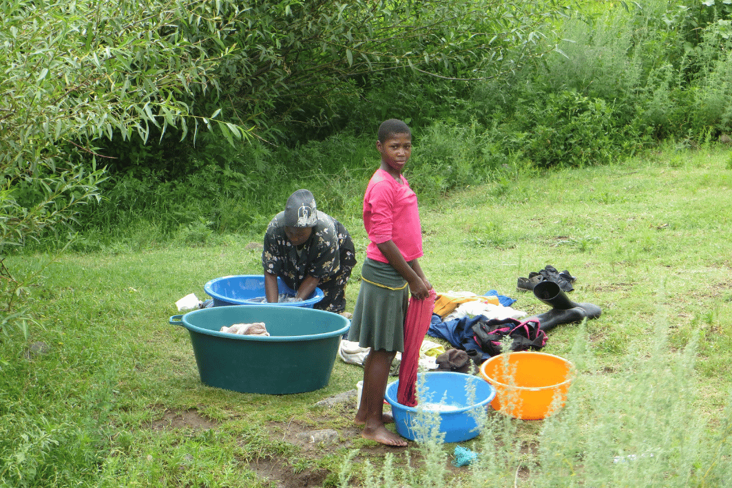 washing laundry outdoors in Lesotho