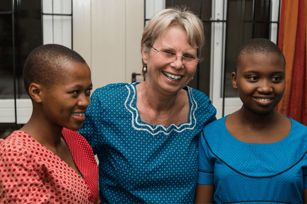Peg with two girls in Lesotho.